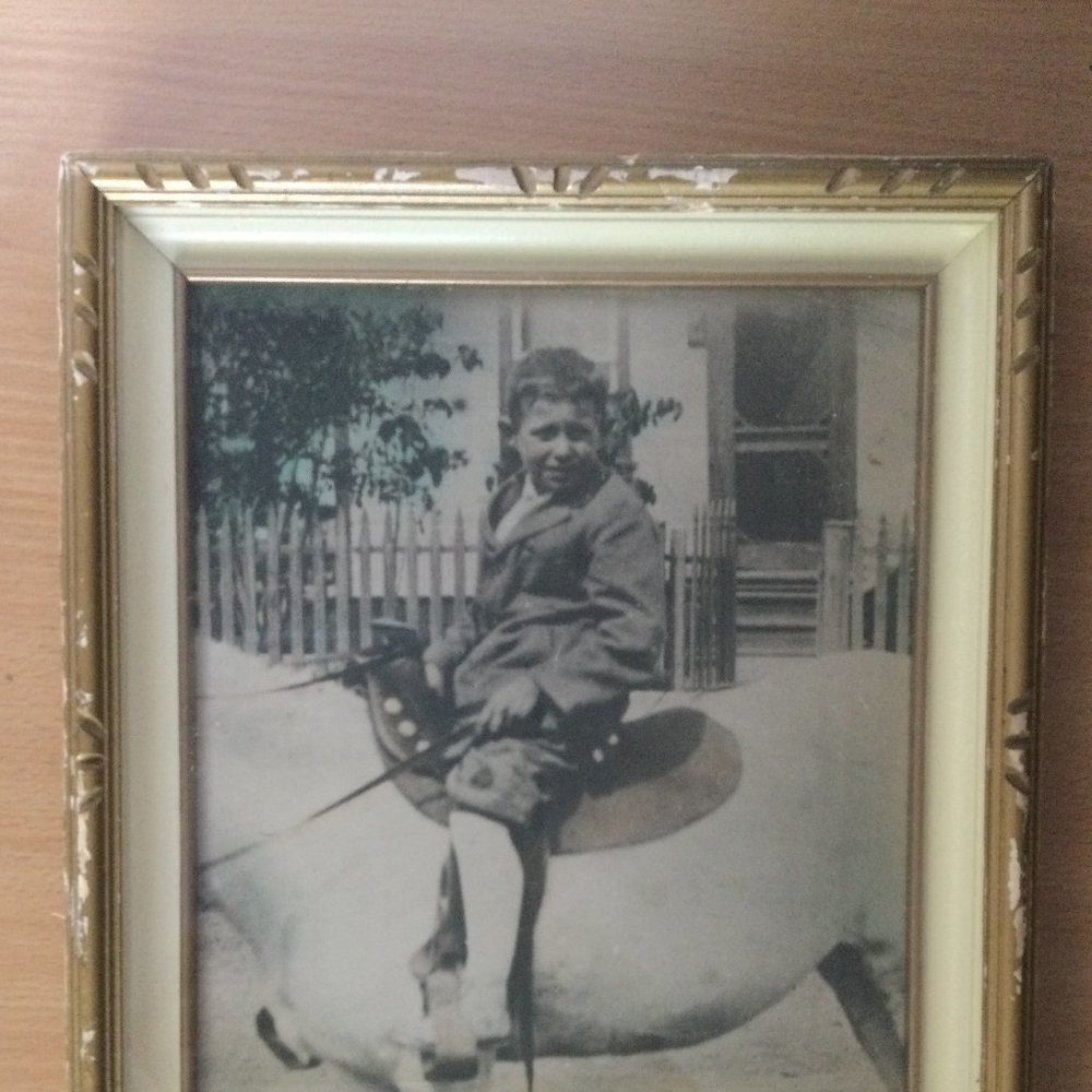 Vintage picture boy riding on horse in front of a house wood frame T. Eaton Co